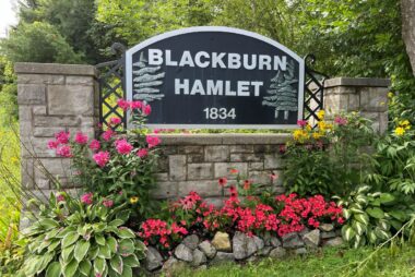 Entrance to Blackburn Hamlet sign and garden